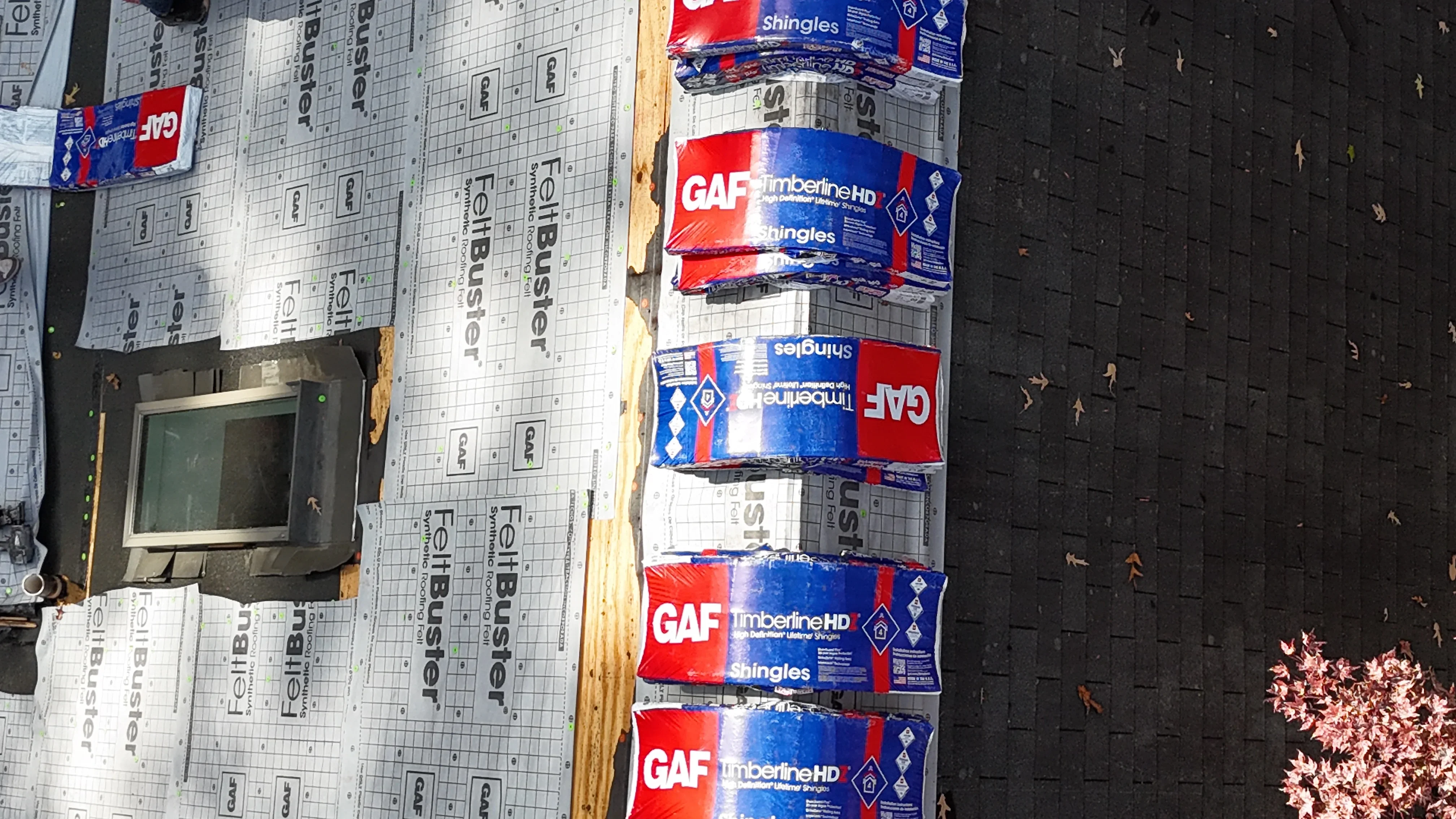 GAF Timberline HD shingles and Felbuster underlayment installed on roof deck with ice and water shield
